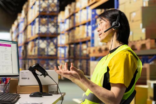 Warehouse staff coordinating logistics in a distribution hub