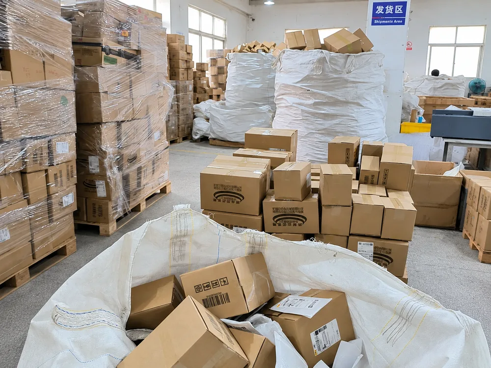 Toy and collectible products being sorted and packed in a 3PL warehouse