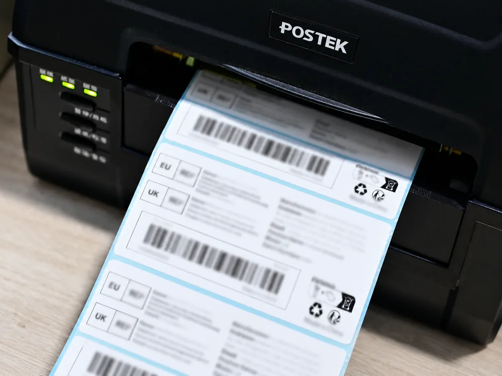 Thermal printer producing barcode shipping labels at a HUIXIN 3PL China warehouse
